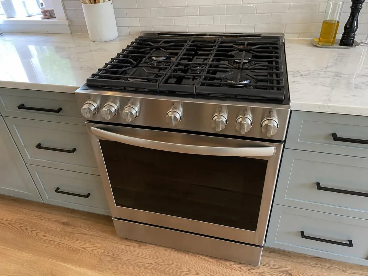 Stainless steel gas range serviced in an Orange County kitchen